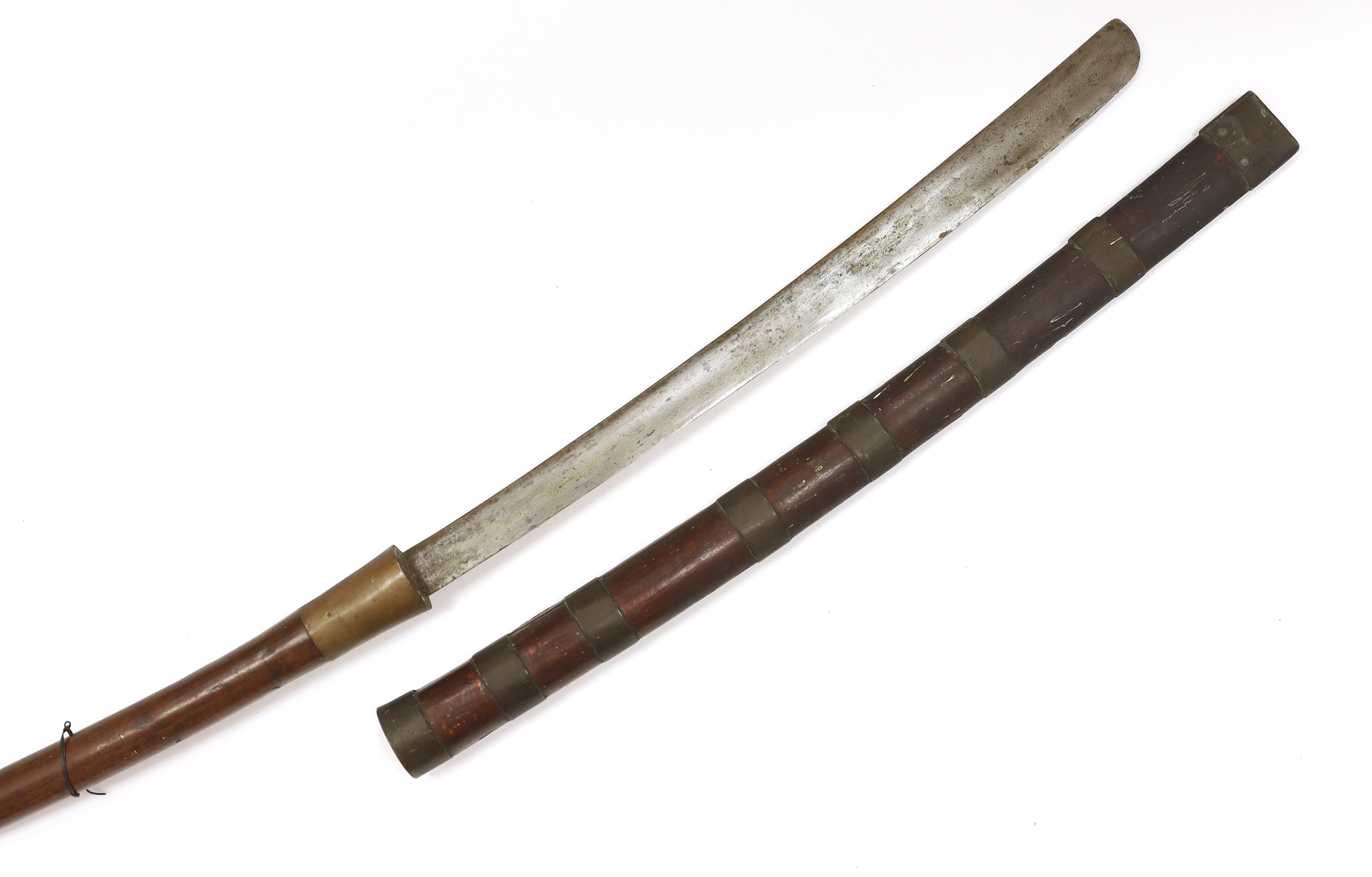 A large 19th century Burmese dha, in a wooden scabbard with metal bands, long wooden grip, blade 67.5cm